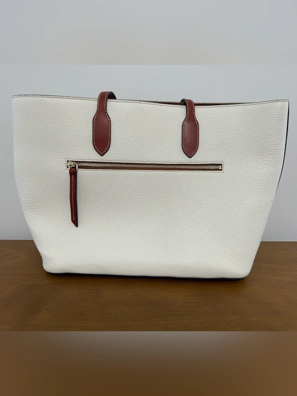 Dooney & Bourke White Pebbled Leather Tote with Brown Trim and Handles